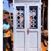 Modern steel front door with a powder-coated finish, custom manufactured by Trust and Smart Metals for residential and commercial buildings.