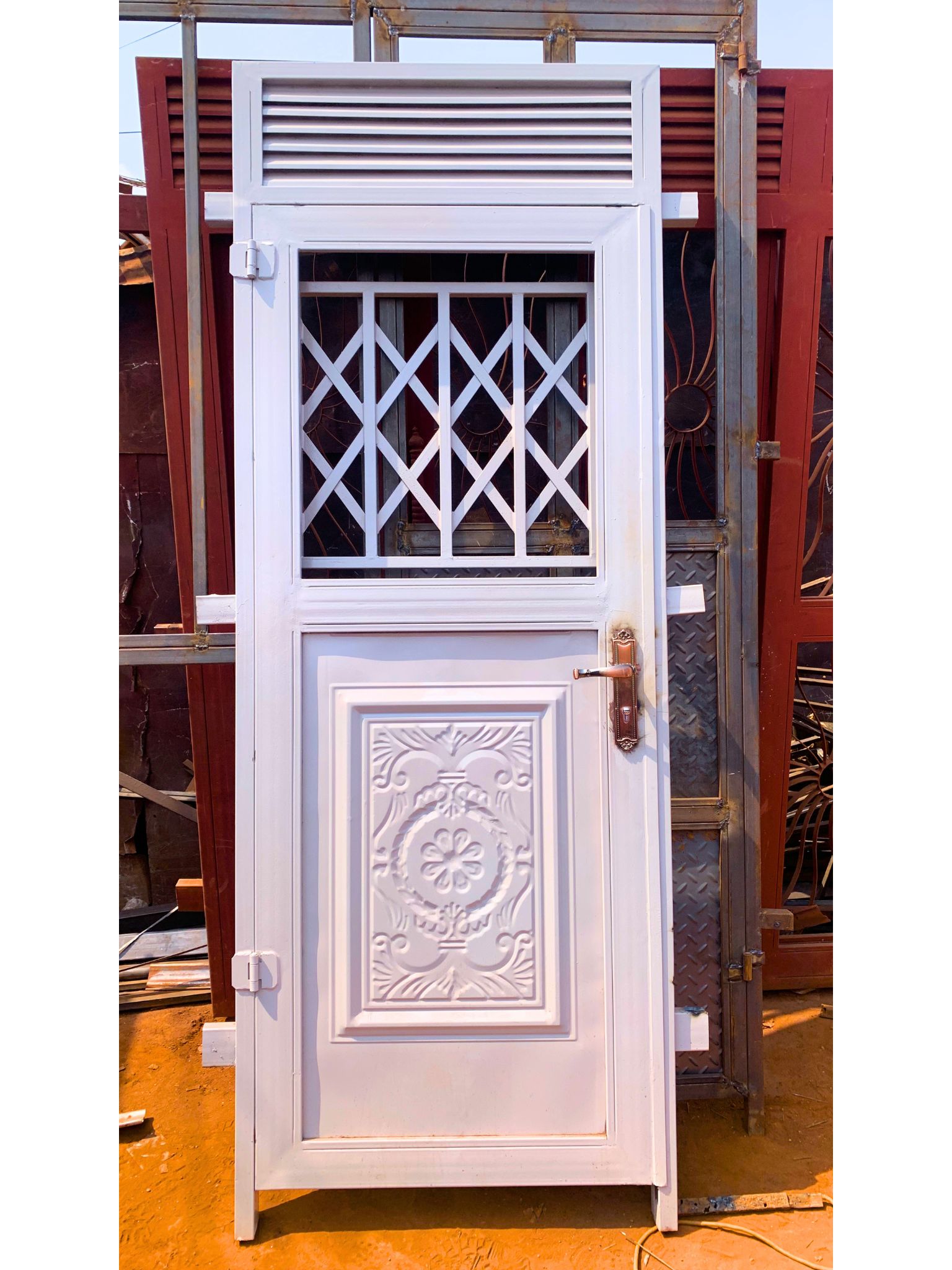 Modern steel half plate design door with a powder-coated finish, custom manufactured by Trust and Smart Metals for residential and commercial buildings.