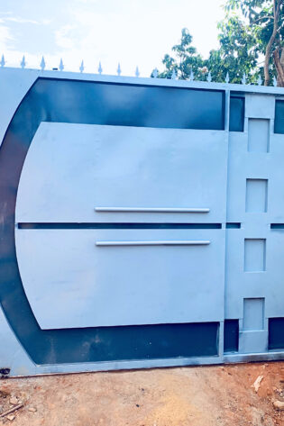 steel modern steel sliding gate manufactured and installed by Trust and Smart Metals.