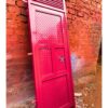 Modern steel plate door with a heavy-duty powder-coated finish, custom manufactured by Trust and Smart Metals.