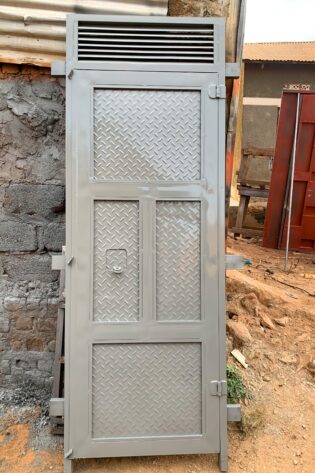 Heavy-duty steel behind door with a solid plate design for enhanced security, manufactured by Trust and Smart Metals.
