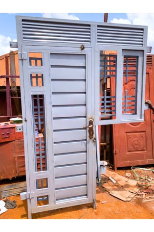 Modern steel combined door with window, featuring a durable powder-coated finish and custom design by Trust and Smart Metals.