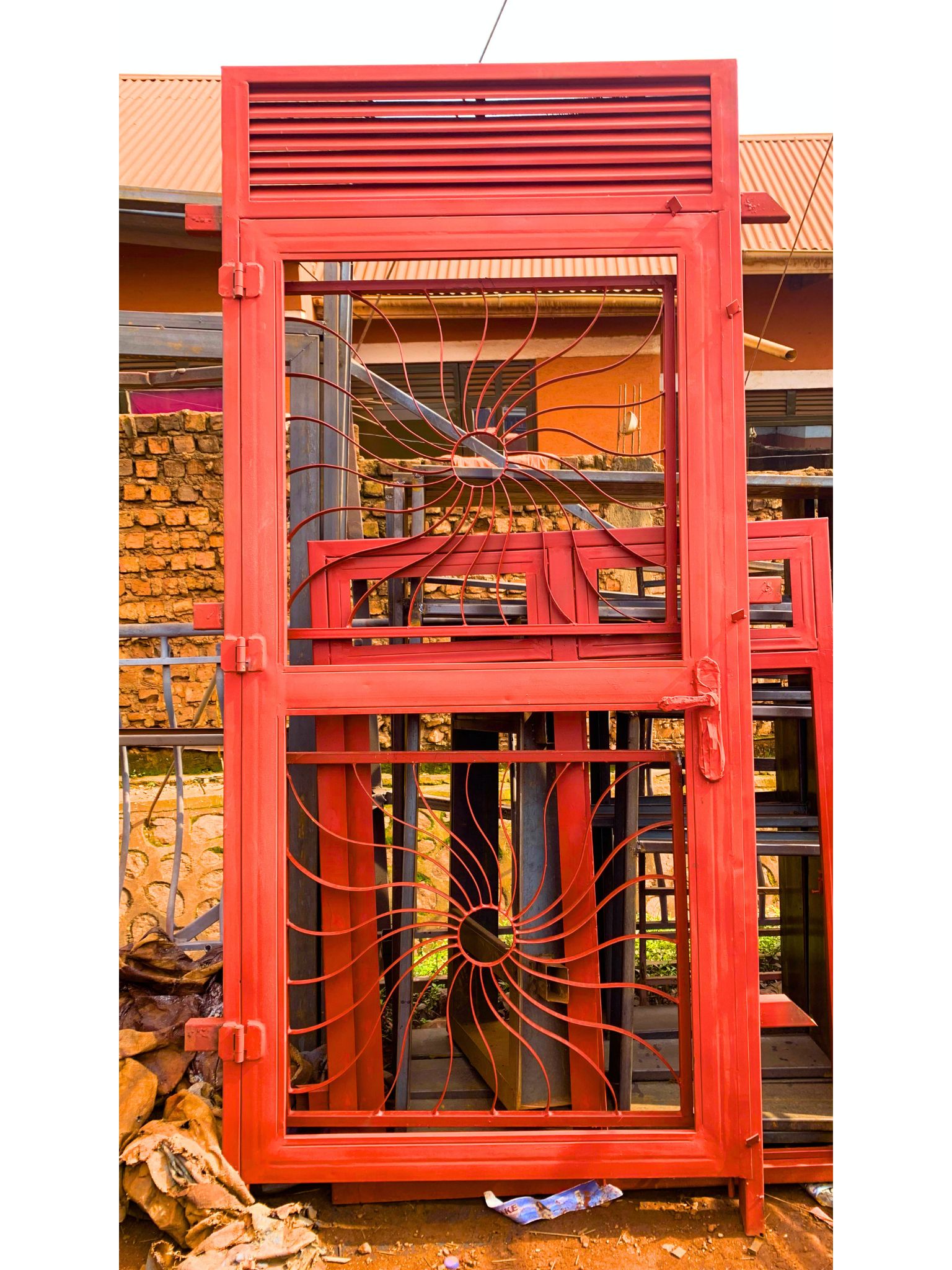 Modern hinged steel front door with a durable powder-coated finish, custom manufactured by Trust and Smart Metals.