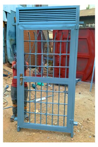 Modern steel double swing door with a durable powder-coated finish, custom manufactured by Trust and Smart Metals for residential and commercial buildings.
