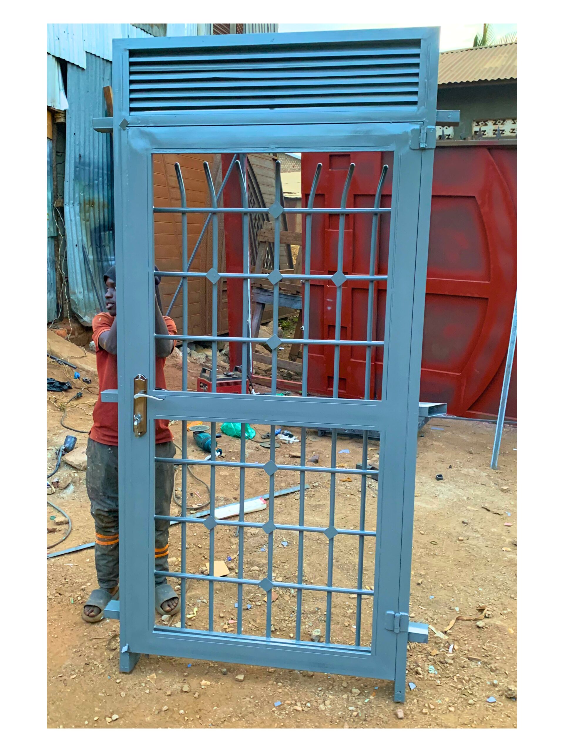 Modern steel double swing door with a durable powder-coated finish, custom manufactured by Trust and Smart Metals for residential and commercial buildings.