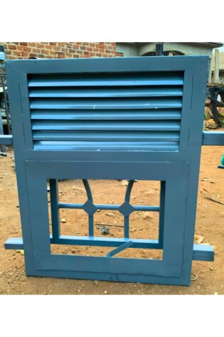 Modern steel washroom window with frosted glass and a powder-coated finish, custom manufactured by Trust and Smart Metals